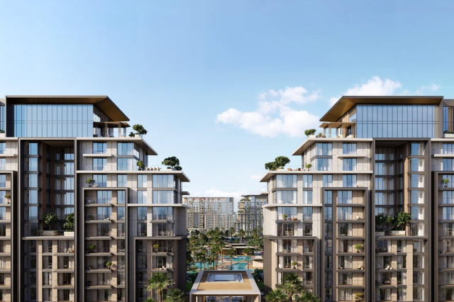 Vue extérieure des tours de City Walk Crestlane 1 à Dubaï avec jardins et piscines