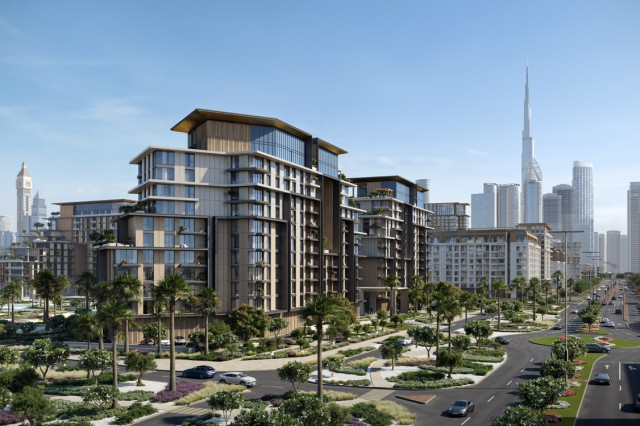 Vue extérieure des tours de City Walk Crestlane 1 à Dubaï avec jardins et piscines