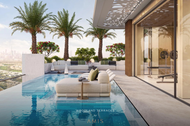 Piscine et espace lounge sur le rooftop de Woodland Terraces
