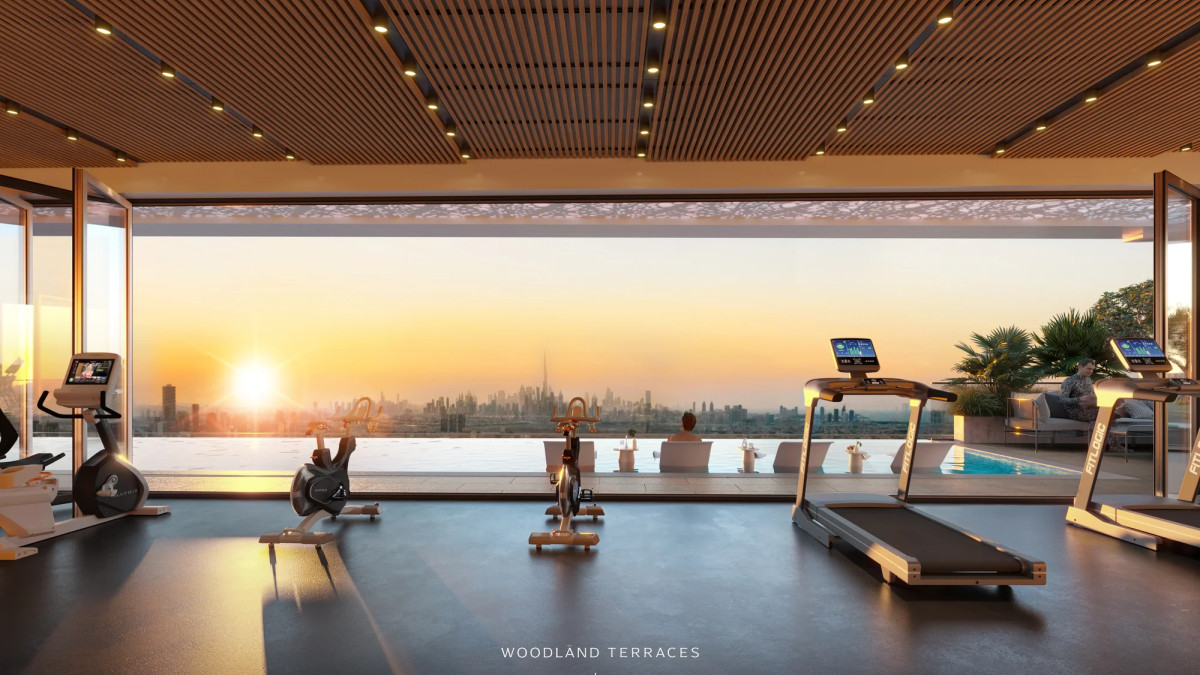 Salle de sport avec vue au coucher du soleil à Woodland Terraces