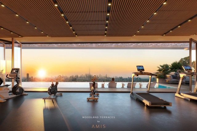 Salle de sport avec vue au coucher du soleil à Woodland Terraces